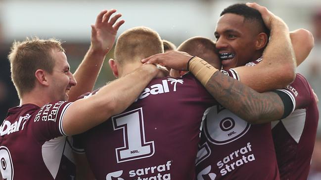 MUDGEE, AUSTRALIA - APRIL 17: Jason Saab of the Sea Eagles celebrates scoring a try with team mates during the round six NRL match between the Manly Sea Eagles and the Gold Coast Titans at Glen Willow Sporting Complex, on April 17, 2021, in Mudgee, Australia. (Photo by Mark Metcalfe/Getty Images)