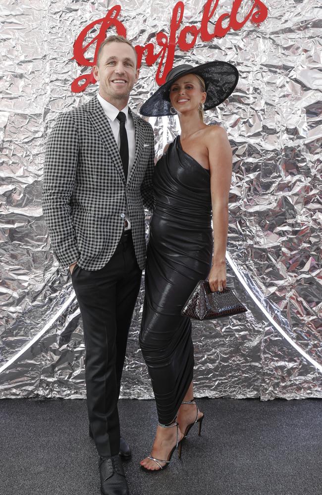 Geelong captain Joel Selwood and wife Brit Selwood in a Norman Kamali dress.