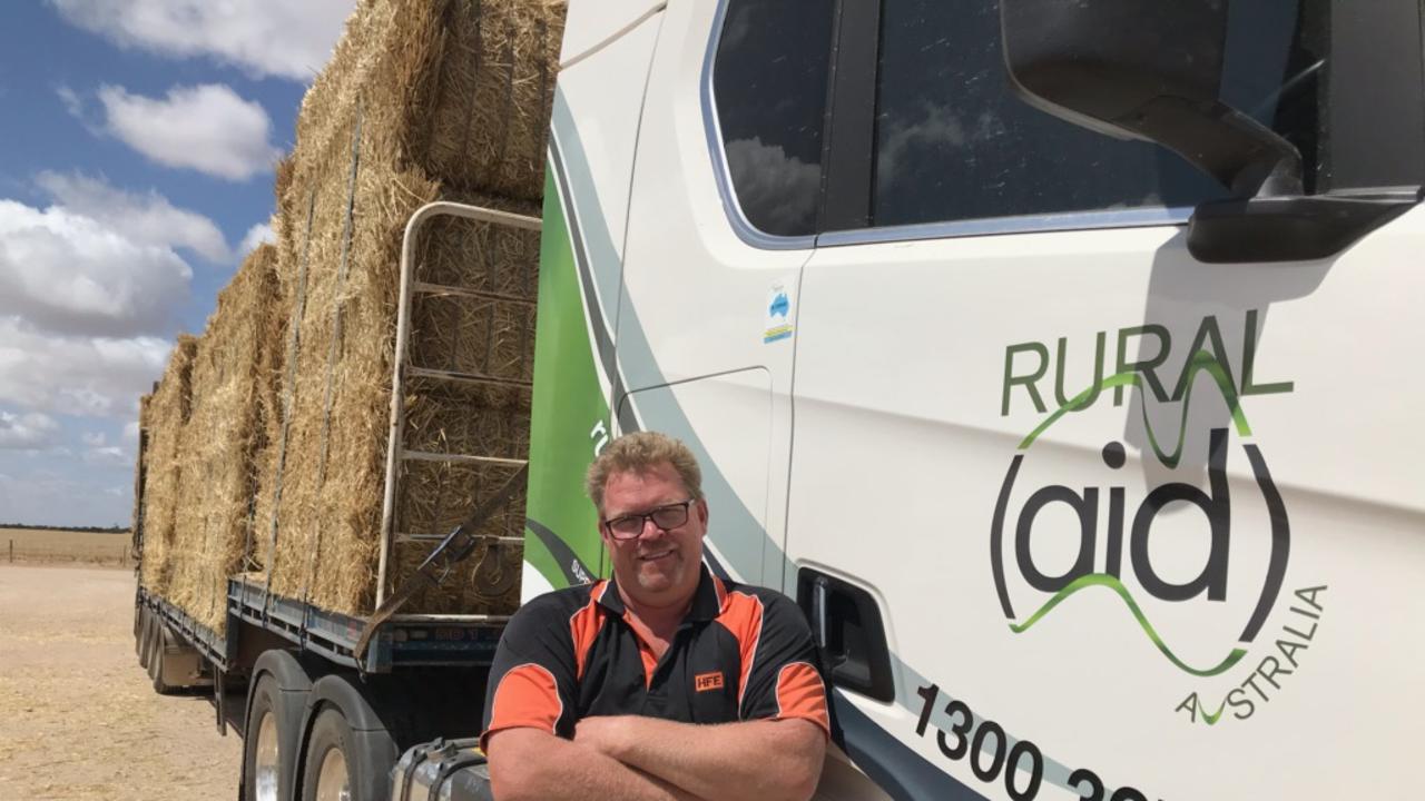 South Australian farmer Michael Hancock uses his own truck to drive and distribute bales across drought-affected states as part of Rural Aid's bale relief effort. Picture: supplied