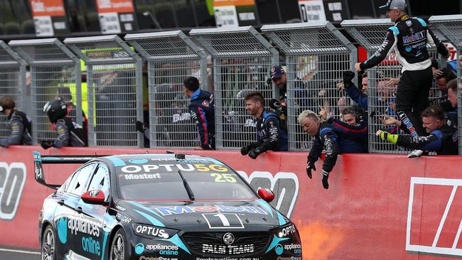 Mostert and his pit crew celebrate their dominant triumph at Mount Panorama. Picture: Getty Images