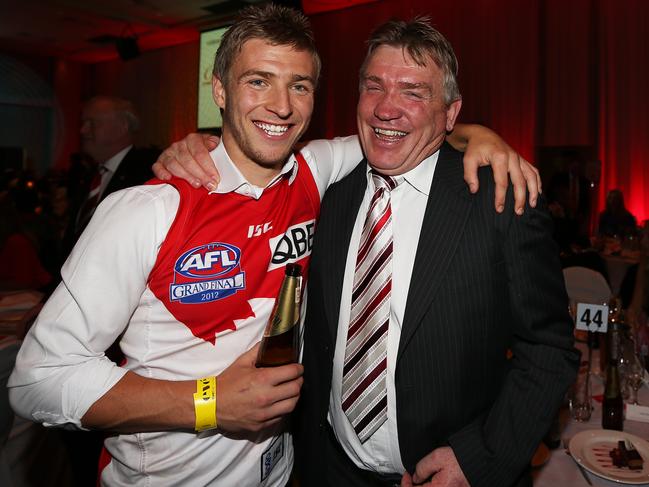 Kieren Jack with his father Garry at the Swans Grand Final function after their victory over Hawthorn in 2012.