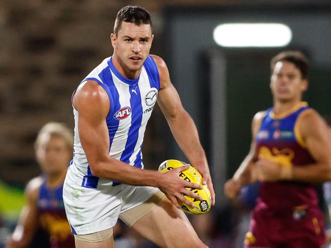 ADELAIDE, AUSTRALIA - APRIL 05: Luke Davies-Uniacke of the Kangaroos in action during the 2024 AFL Round 04 match between the Brisbane Lions and the North Melbourne Kangaroos at Norwood Oval on April 05, 2024 in Adelaide, Australia. (Photo by Dylan Burns/AFL Photos via Getty Images)