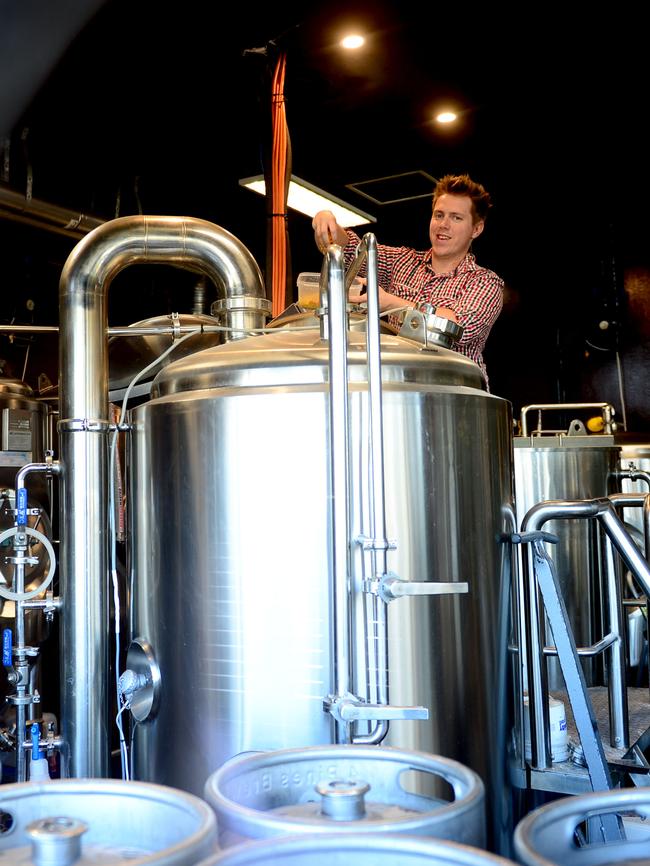 Bryn gets stuck into cooking in the brewery. Photo Jeremy Piper