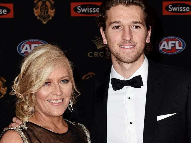 Marcus Bontempelli and Geraldine Bontempellli arrive at the 2016 Brownlow Medal Count at the Crown Palladium in Melbourne, Monday, Sept. 26, 2016. (AAP Image/Julian Smith) NO ARCHIVING,