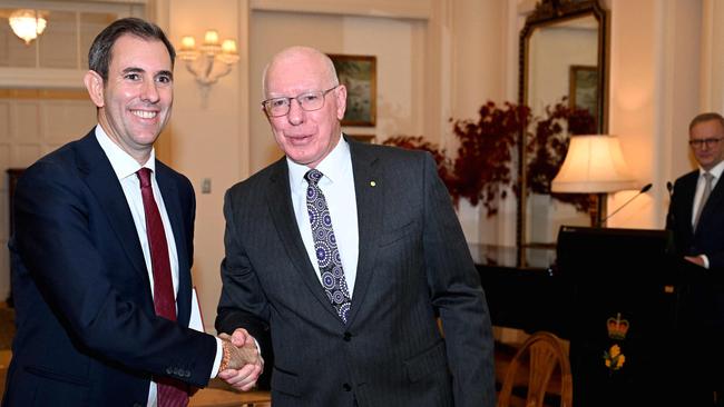 Australia's new Treasurer Jim Chalmers shakes hands with Governor-General David Hurley after taking his oath. Picture: AFP