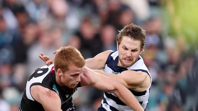 Tom Atkins willed Geelong over the line against Port Adelaide.