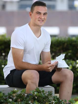 Campbell Byrd, now aged 16, with the letter from Cameron Baird. Picture: Bob Barker