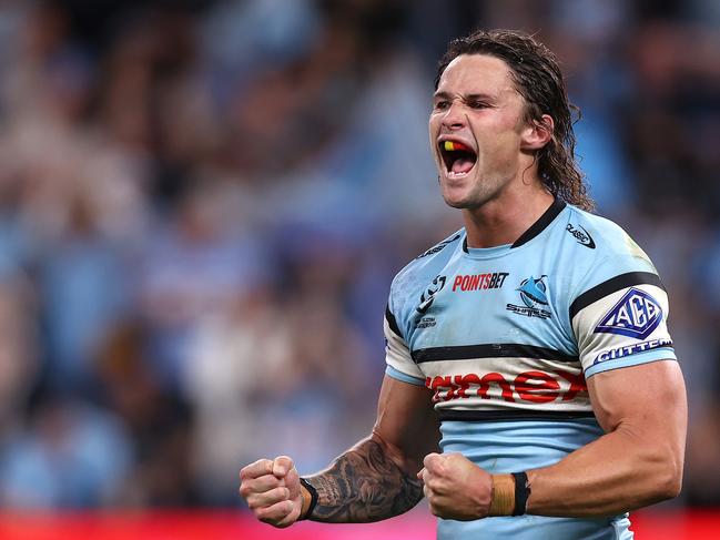 SYDNEY, AUSTRALIA - SEPTEMBER 20:  Nicho Hynes of the Sharks celebrates winning the NRL Semi Final match between Cronulla Sharks and North Queensland Cowboys at Allianz Stadium on September 20, 2024 in Sydney, Australia. (Photo by Jason McCawley/Getty Images)