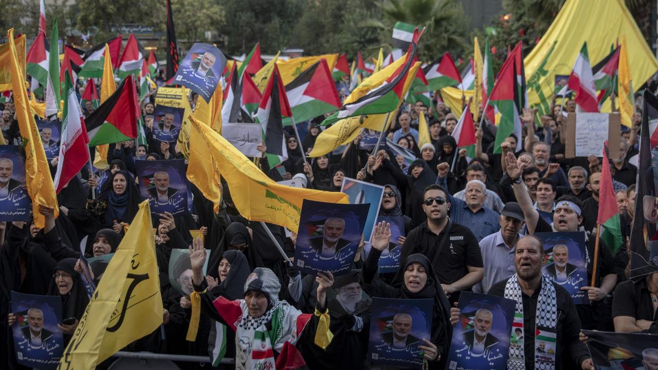 Hundreds of Iranians take part in a protest against the killing of Ismail Haniyeh in Palestine Square in Tehran. Picture: Majid Saeedi/Getty Images
