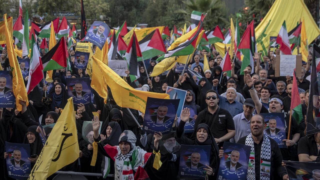 Hundreds of Iranians take part in a protest against the killing of Ismail Haniyeh in Palestine Square in Tehran. Picture: Majid Saeedi/Getty Images