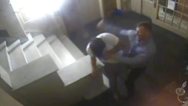 CCTV footage of Matt Lodge assaulting Joseph Cartright in his New York apartment foyer.