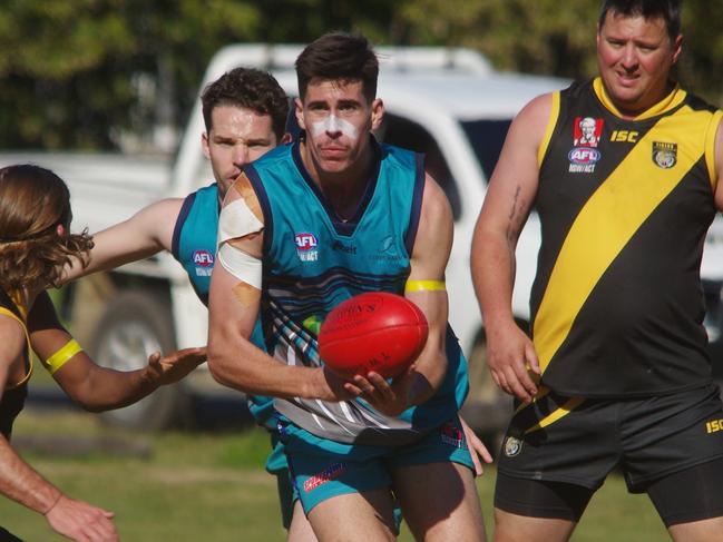 It was a tough day at the office for the Grafton Tigers AFL team on Saturday.