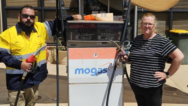 MOGAS Cookes Outback Motorsowner Kim Logan, pictured with local Jessie Evans, said the situation was dire for many of the residents. Picture: Supplied