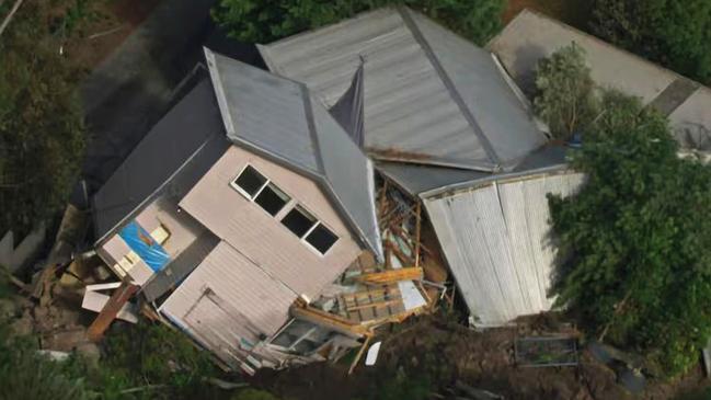 A person has been injured after a house toppled over during an apparent landslide in regional Victoria. Emergency services were called to a property on View Point Rd in McCrae on the Mornington Peninsula - about 59km south of Melbourne - about 8.45am Tuesday after a landslide caused the building to topple over. Picture: ABC