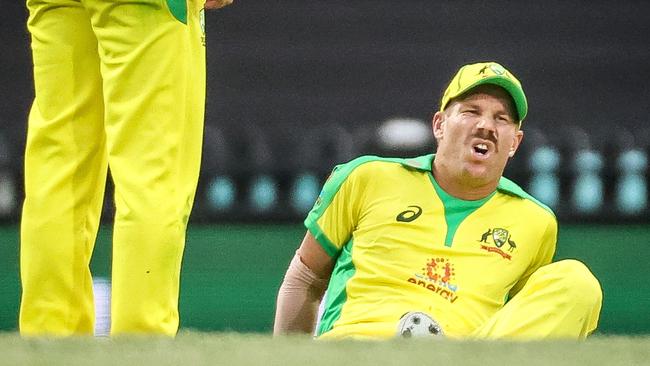 David Warner suffers a groin injury at the SCG on Sunday night. Picture: AFP