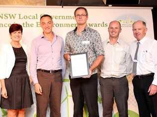 Minister for the Environment Robyn Parker presents the Local Government Excellence in the Environment Award to Lismore City Council's ecologist, Damian Licari; integrated strategic planner, Steve Denize; environmental strategies coordinator, Nick Stephens; and Bernie Bugden from Hawkesbury Nepean Catchment Management Authority.