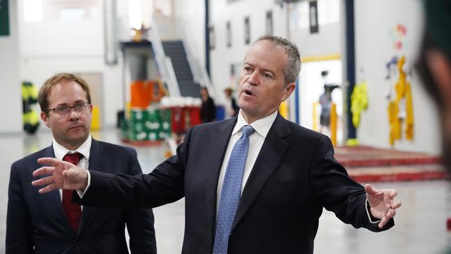 Opposition Leader Bill Shorten is seen talking with staff during a visit to WooliesX in West Footscray in Melbourne on Thursday, March 14, 2018. (AAP Image/Stefan Postles) NO ARCHIVING