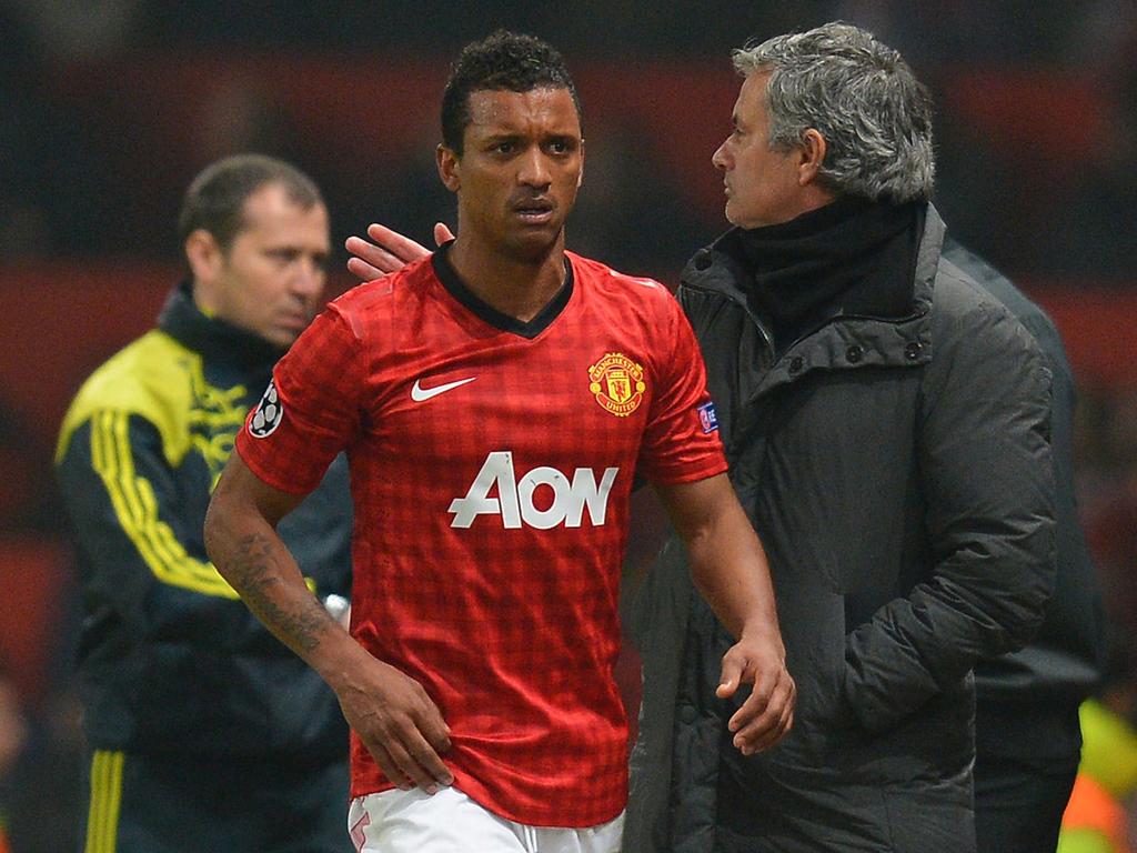 Then Real Madrid coach Jose Mourinho gives Nani a pat on the back. Picture: AFP Photo / Andrew Yates