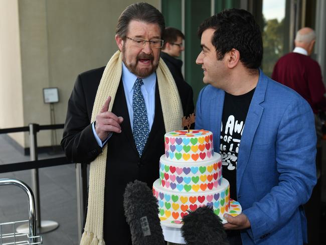 Derryn Hinch's Justice Party Senator Derryn Hinch (left) joins Labor Senator Sam Dastyari with his Marriage Equality Cake. Picture: AAP