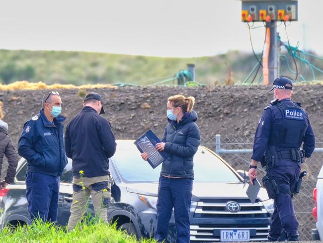 Police at the Wollert Landfill in June. Picture: Luis Ascui