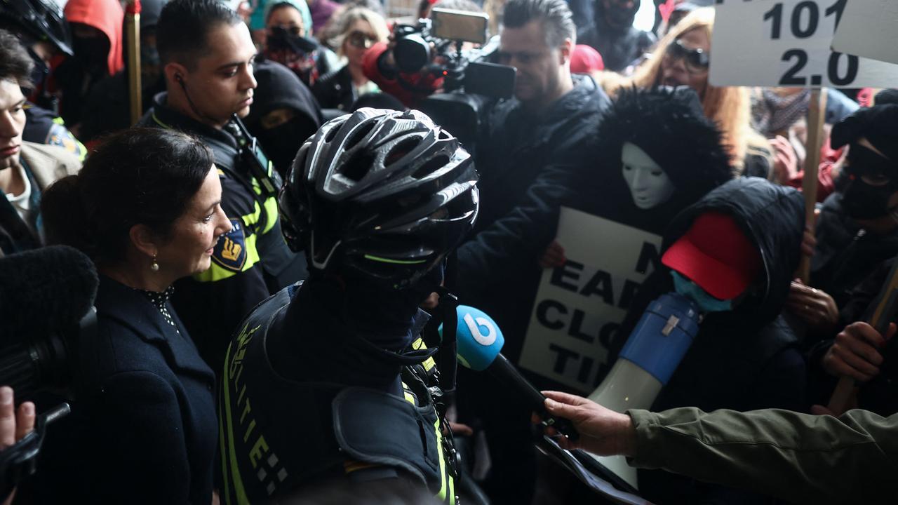 Mayor Femke Halsema, left, speaking to protesters. Picture: Kenzo Tribouillard/AFP