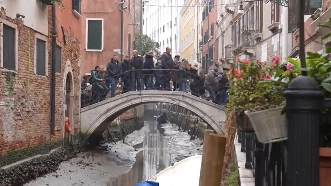 The freak water levels have also disrupted the city’s carnival, which has drawn more than 100,000 tourists to the city, now unable to navigate its historic canals. Picture: Newsflash/Australscope