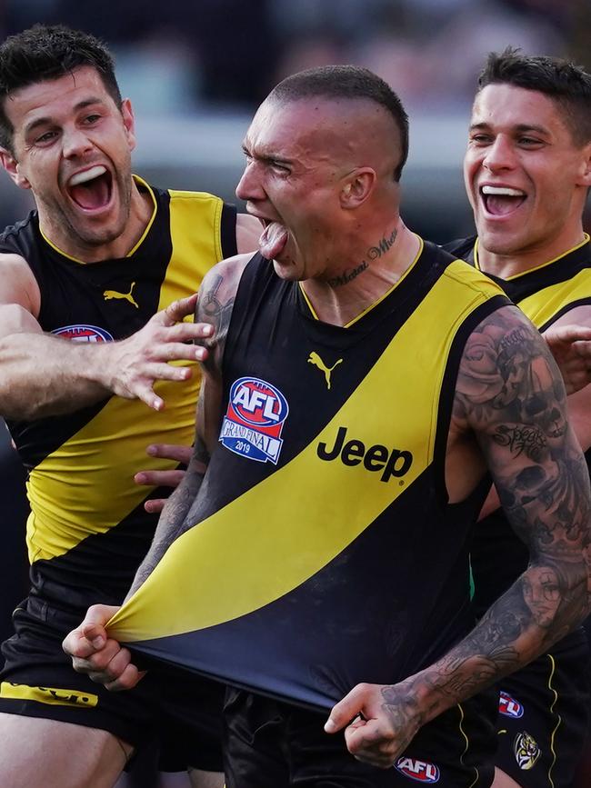 *This picture has been selected as one of the Best of the Year Sports images for 2019*Dustin Martin of the Tigers celebrates a goal during the 2019 AFL Grand Final between the Richmond Tigers and the GWS Giants at the MCG in Melbourne, Saturday, September 28, 2019. (AAP Image/Michael Dodge) NO ARCHIVING