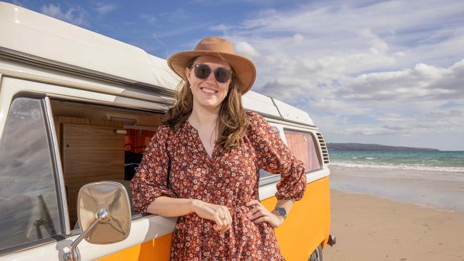 Journalist Kathryn Bermingham, with Nelson the Voice Van on Aldinga Beach SA. Picture: Ben Clark