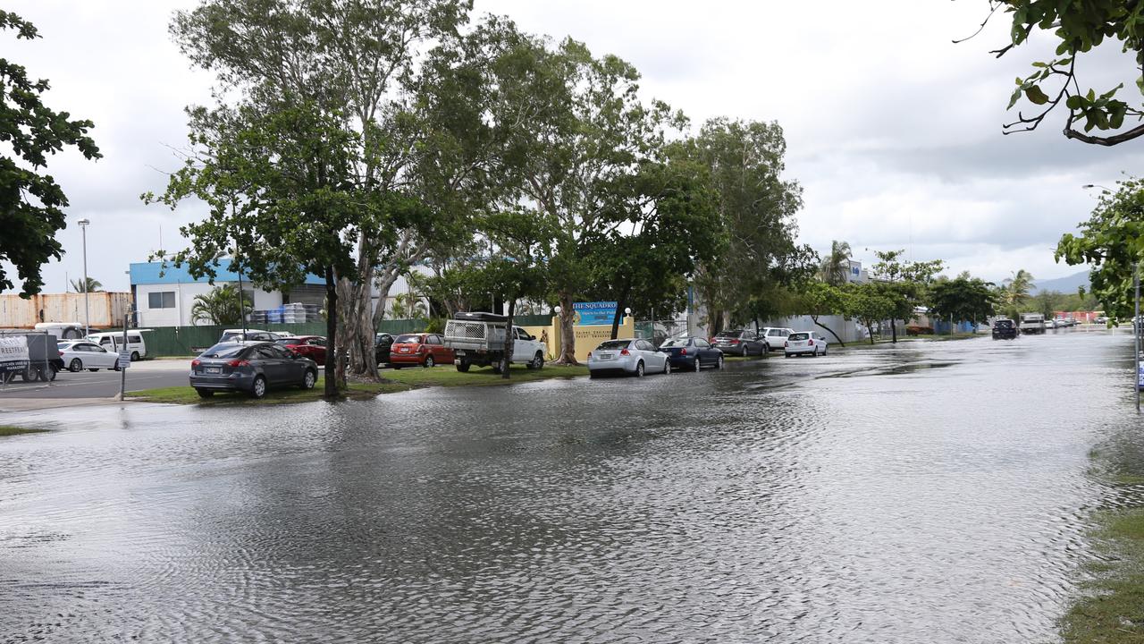 King tides peak at Cairns, flooding roads and local businesses at