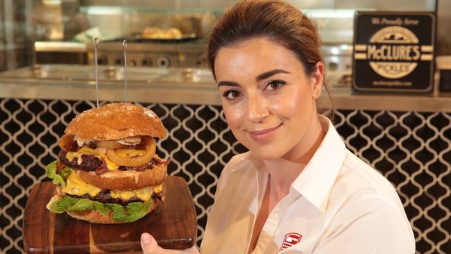 Mrs Grimston shows off the giant burger.