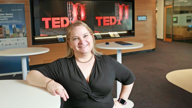 Juanita Wheeler in a class room where she is talking to and working collaboratively with a team like a mock TED talk in 2017. Photo: Tim Marsden.