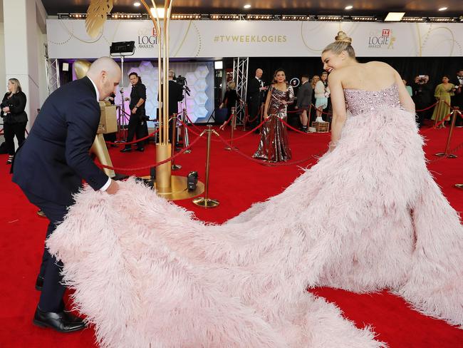 Everybody needs good Neighbours! Ryan Moloney and April Rose Pengilly on the red carpet at the Gold Coast Convention and Exhibition Centre. Picture: Image/Josh Woning