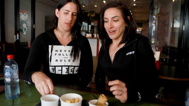 Deborah Kallu and Elena Alvaro at Grill’d burger restaurant on the Church St. Picture: Angelo Velardo