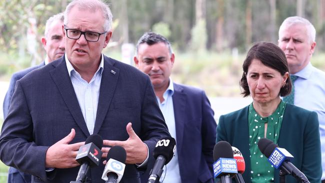 Scott Morrison with NSW Deputy Premier John Barilaro, Premier Gladys Berejiklian and Nationals leader Michael McCormack near Ballina on Thursday. Picture: AAP