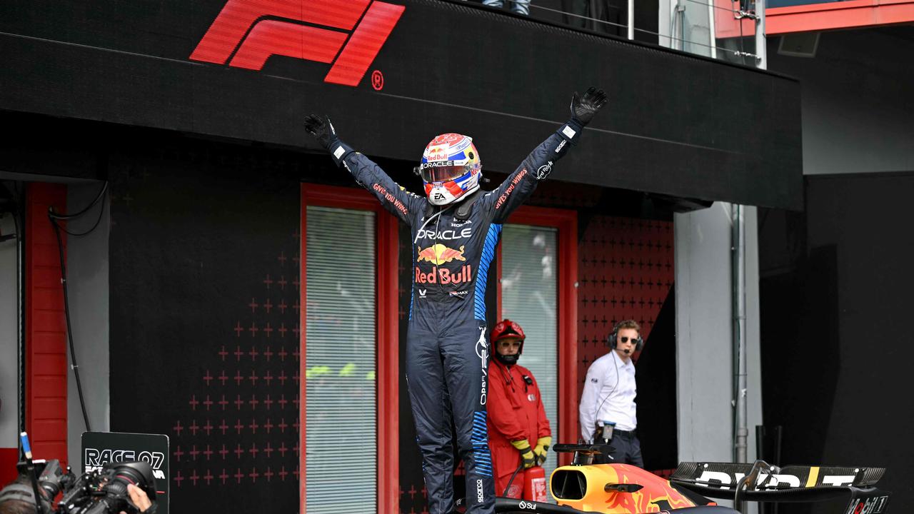 Max Verstappen celebrates after winning an uneventful Emilia Romagna Formula One Grand Prix. (Photo by ANDREJ ISAKOVIC / AFP)