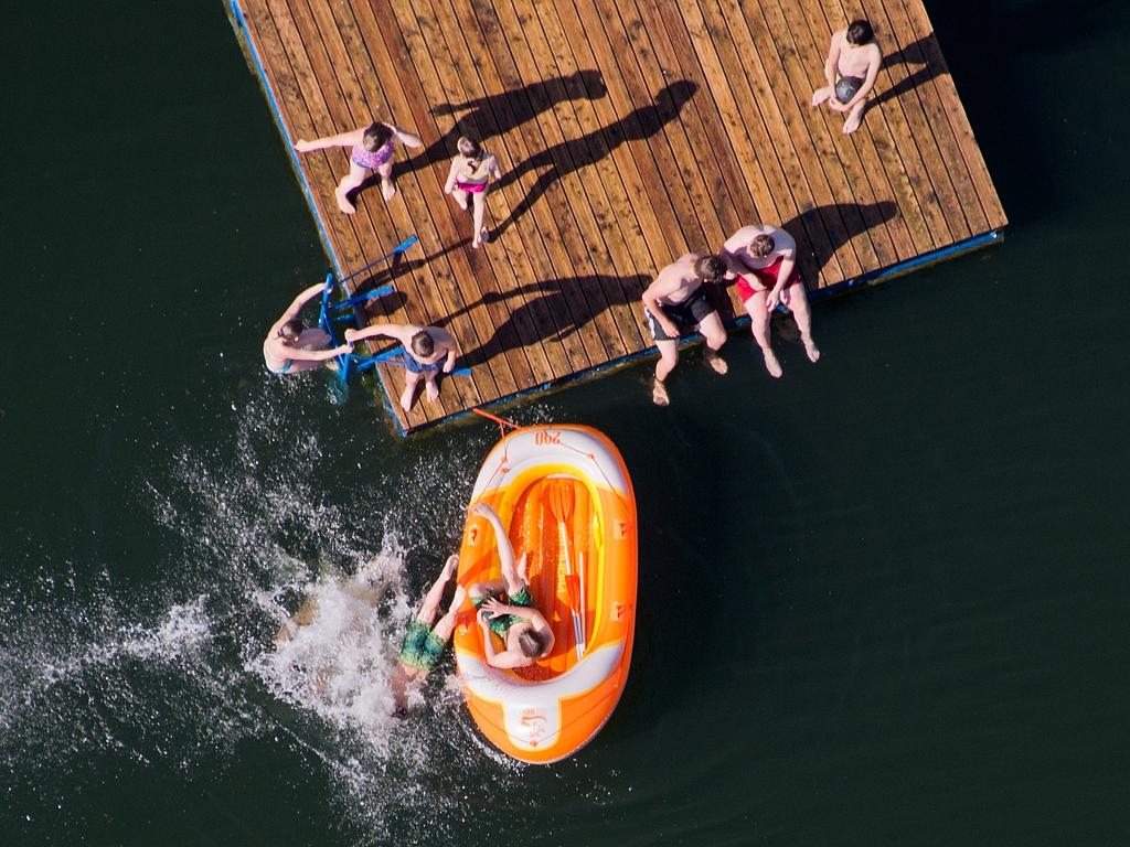 Aerial view of children playing with a rubber boat at Heiseder Lake at Sarstedt near Hildesheim on June 30, 2015. Picture: AFP