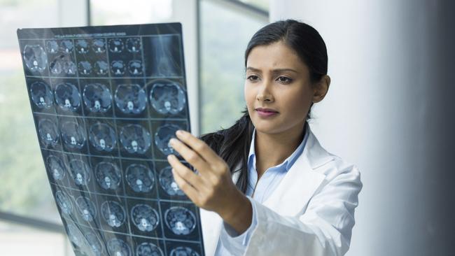 Generic photo in hospital - doctor looking at an xray (x-ray). Picture: iStock