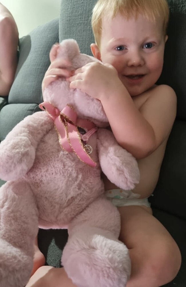 This should have been a photo of Jaxon on his second birthday, holding his baby sister, Sophie. Instead, he cuddles a Pink teddy bear named Sophie. He is too young to understand his the ashes of his little sister are inside. “I wanted a photo of them together,” says their mum, Nikki. Picture: Supplied