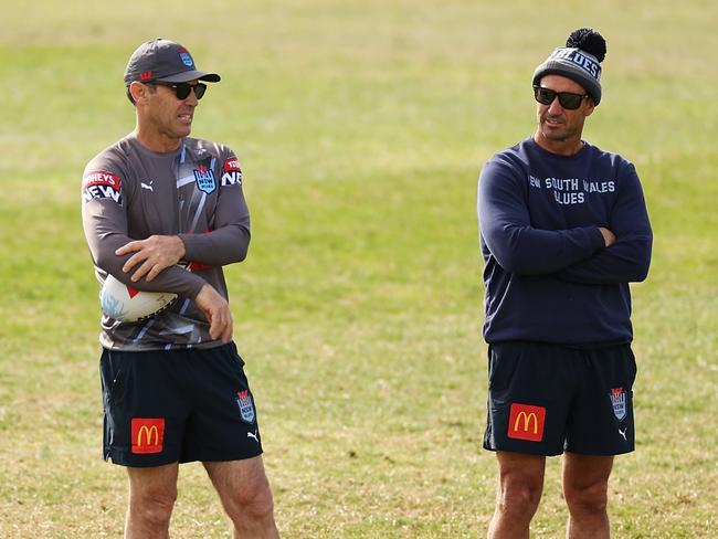 (L-R) Blues coach Brad Fittler and assistant coach Andrew Johns talk during a New South Wales Blues State of Origin training session. Picture: Getty Images