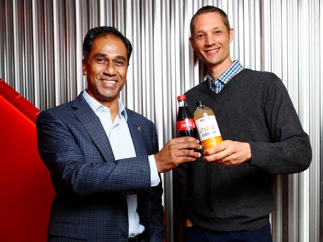 Coca-Cola South Pacific President Vamsi Mohan with Anthony Crabb, co-founder and CEO of Organic &amp; Raw Co. Picture: Hollie Adams/The Australian