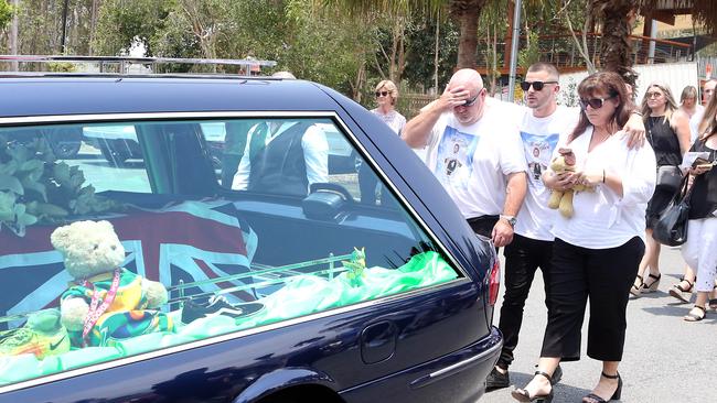 Jack’s older brother Mitch with parents Brett and Belinda Beasley at the funeral. Picture: AAP/Richard Gosling