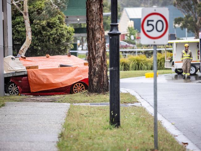 A concrete slab fell on the car after it ploughed into the supermarket. Picture: Jake Nowakowski