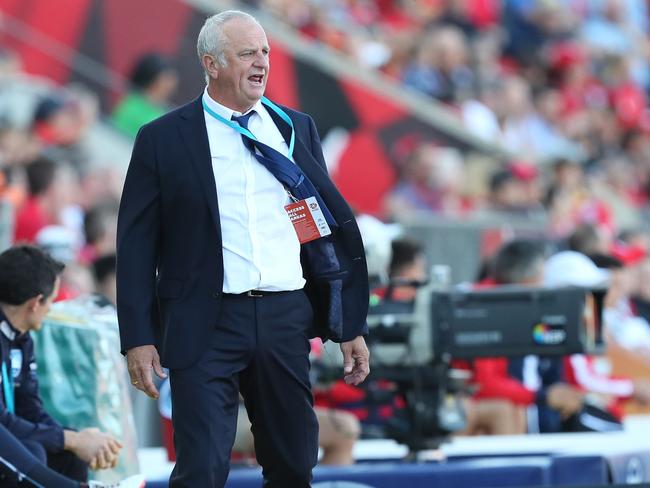 Graham Arnold revs up his men from the sideline in Adelaide. Picture: AAP