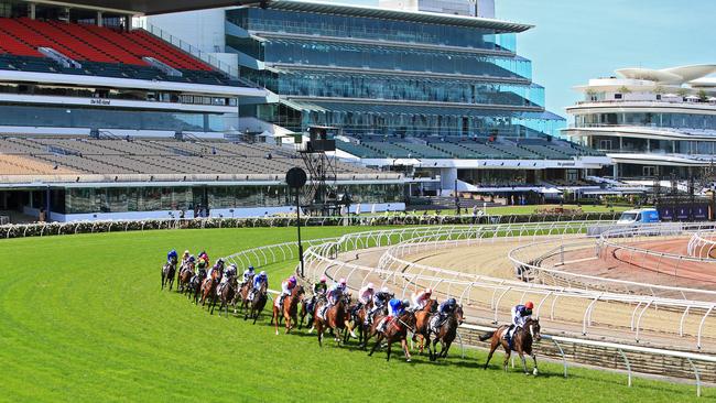 Empty stands as the Melbourne Cup field races at Flemington racecourse. Picture: Aaron Francis