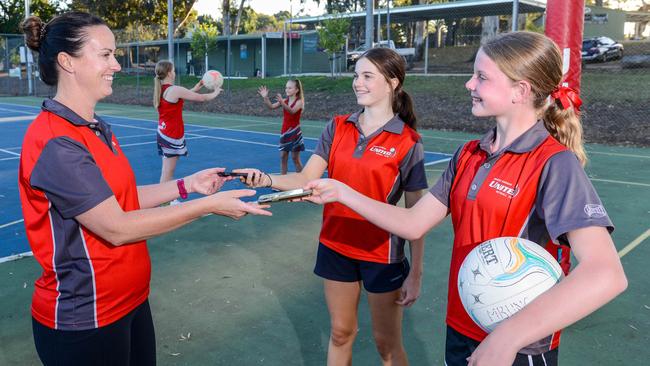 Mt Barker United Netball Club coach Renee Bell says sport is a great way to get kids off their phones and away from social media. She is pictured here with Maddie Tidemann and her daughter, Airlee Bell. Picture: Brenton Edwards