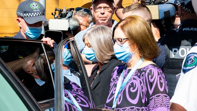 Police and court Sheriff’s Officer surround chief public health officer Nicola Spurrier as she leaves court. Picture: NCA NewsWire / Morgan Sette