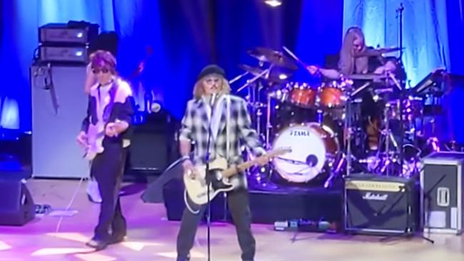 Depp surprised fans of Jeff Beck, by joining the veteran rocker on his UK tour dates. Beck and Depp are pictured performing in Sheffield, England. Picture: Supplied