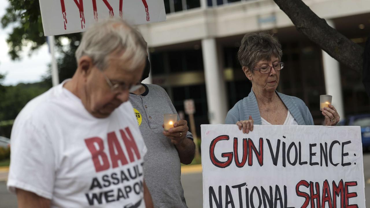 Gun-control advocates hold a vigil outside of the National Rifle Association (NRA) headquarters. Picture: Kevin Dietsch/Getty Images/AFP