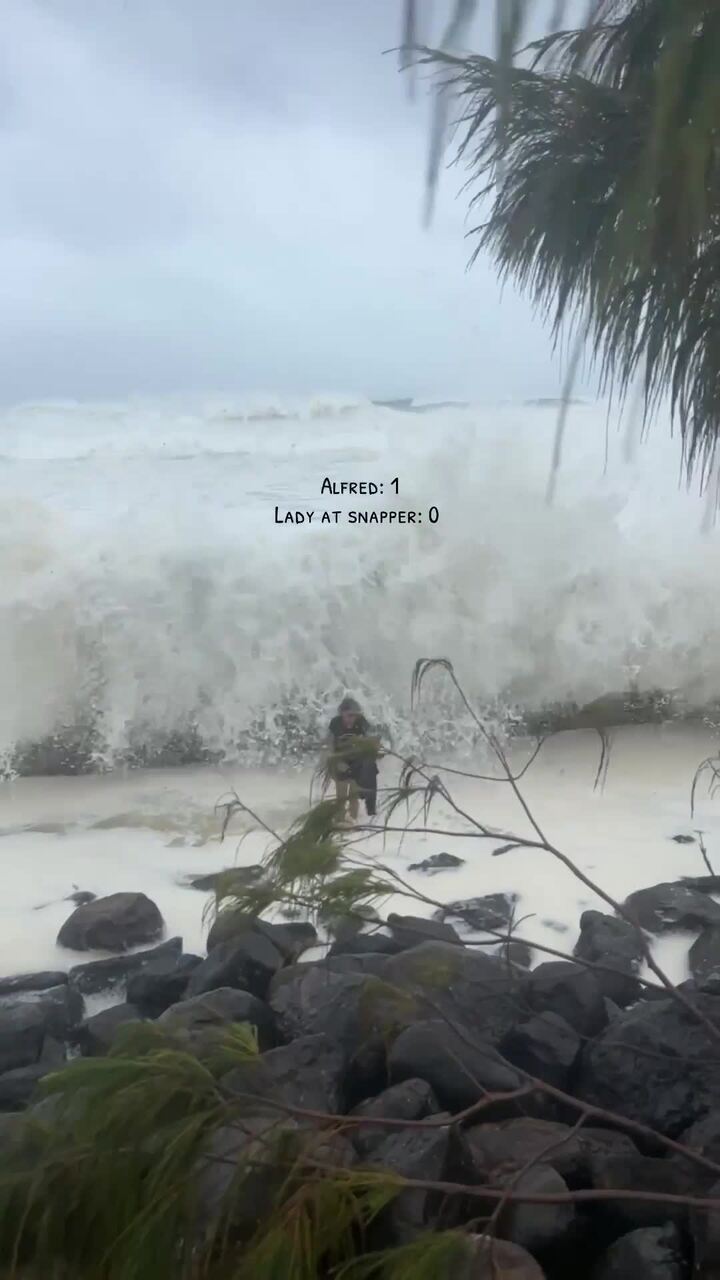 Woman wiped out by Cyclone Alfred wave surge at Snapper