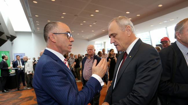 19/12/2018 NAB CEO Andrew Thorburn and Chairman Ken Henry chat before the AGM at Melbourne Convention Centre.Picture : David Geraghty / The Australian.